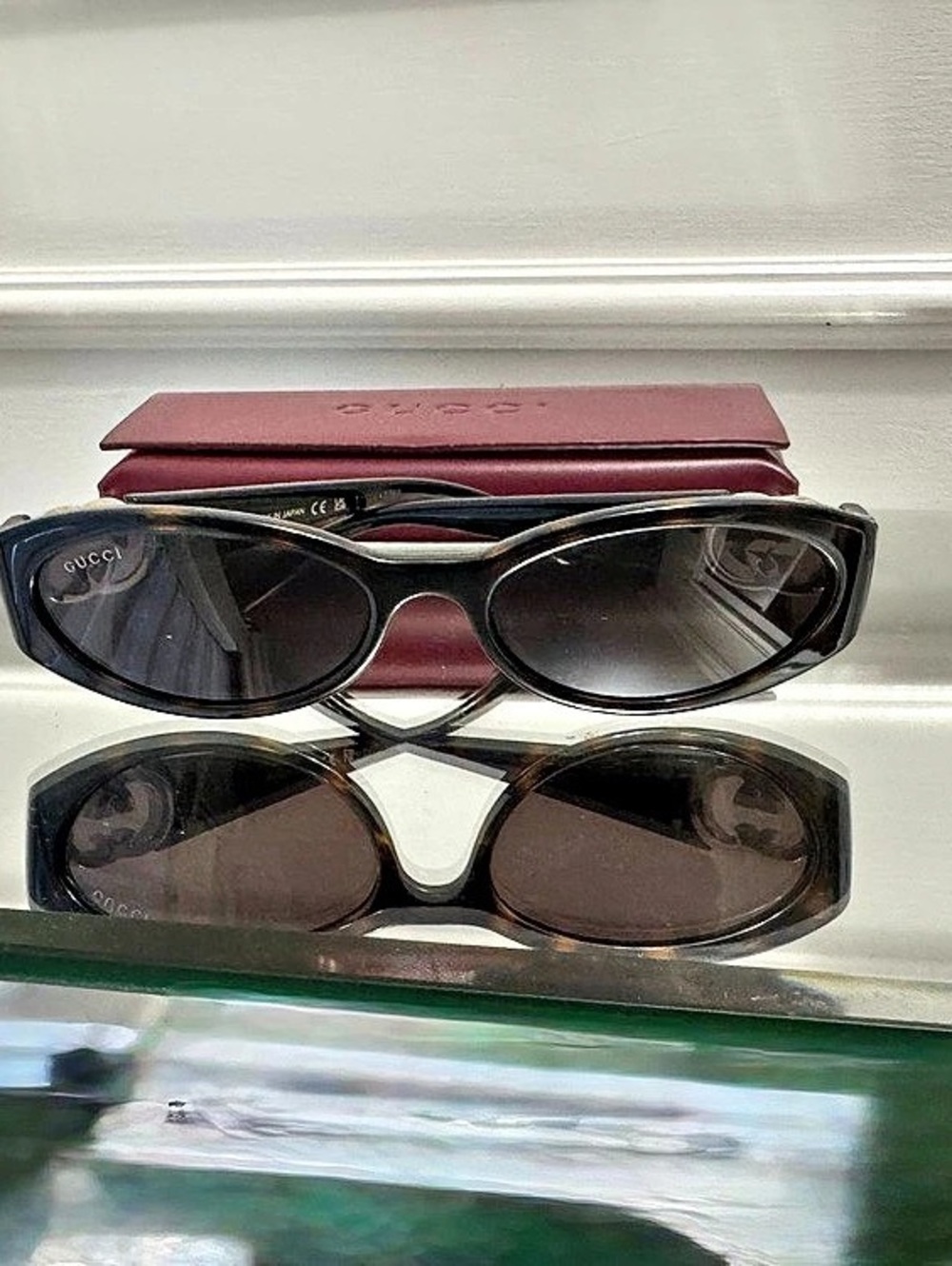 Gucci GG1660S Oval Sunglasses Black & Gold